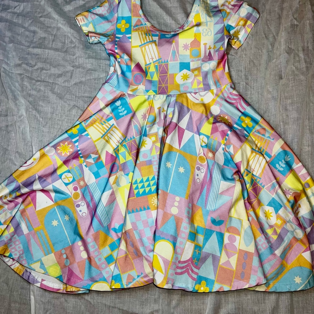 Wild Rich kids brand. Small world Disney theme